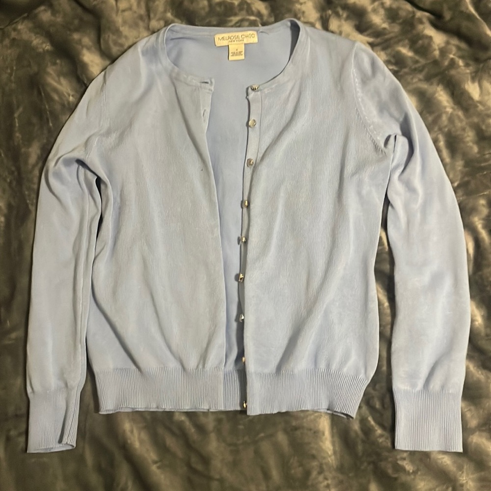 Size small. Light blue cardigan.